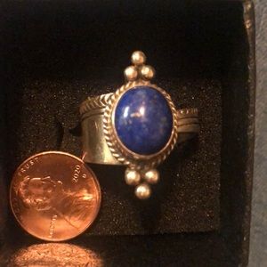 Southwestern style real lapis stone and sterling silver 925. Adjustable band.